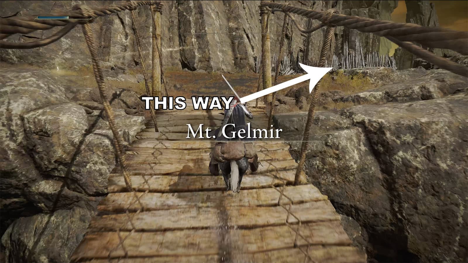 An image of an Elden Ring playable character crossing a roped bridge and entering Mt Gelmir